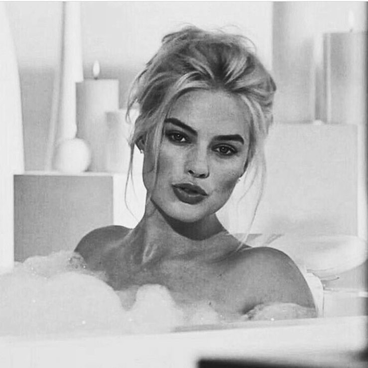 Margot Robbie smiles bikini
